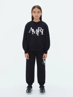AMIRI STAGGERED SCRIBBLE SWEATPANT