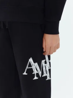 AMIRI STAGGERED SCRIBBLE SWEATPANT