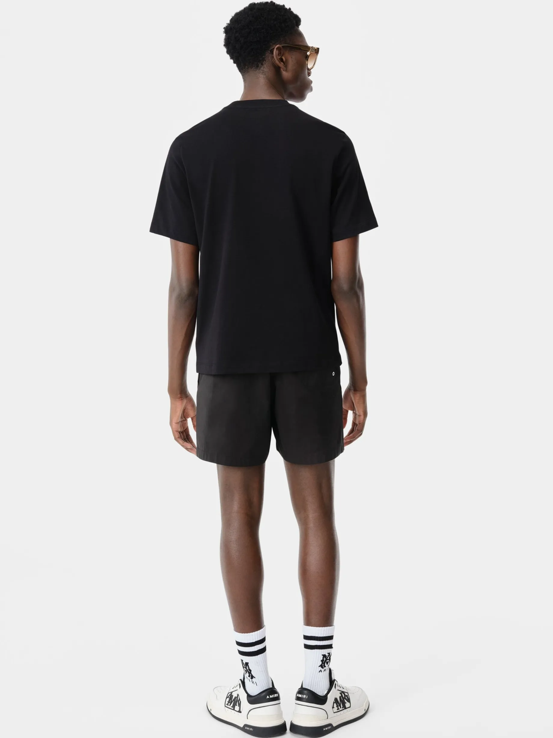 AMIRI TWISTED PALMS SWIM TRUNK